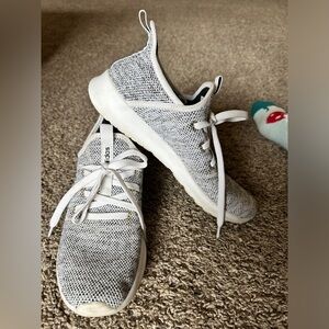 Adidas athletic shoes. Good condition worn a couple times around the house.